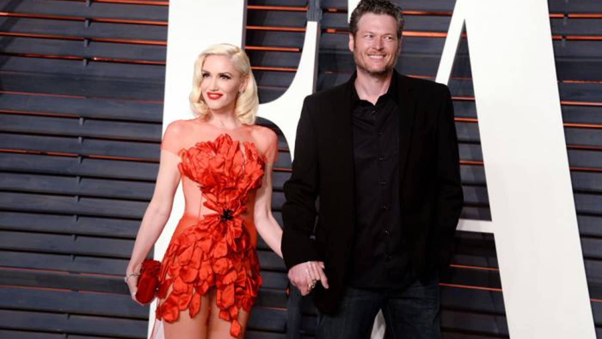 SEE IT: Gwen Stefani Rocks Sheer Red Dress, Beau Blake ...