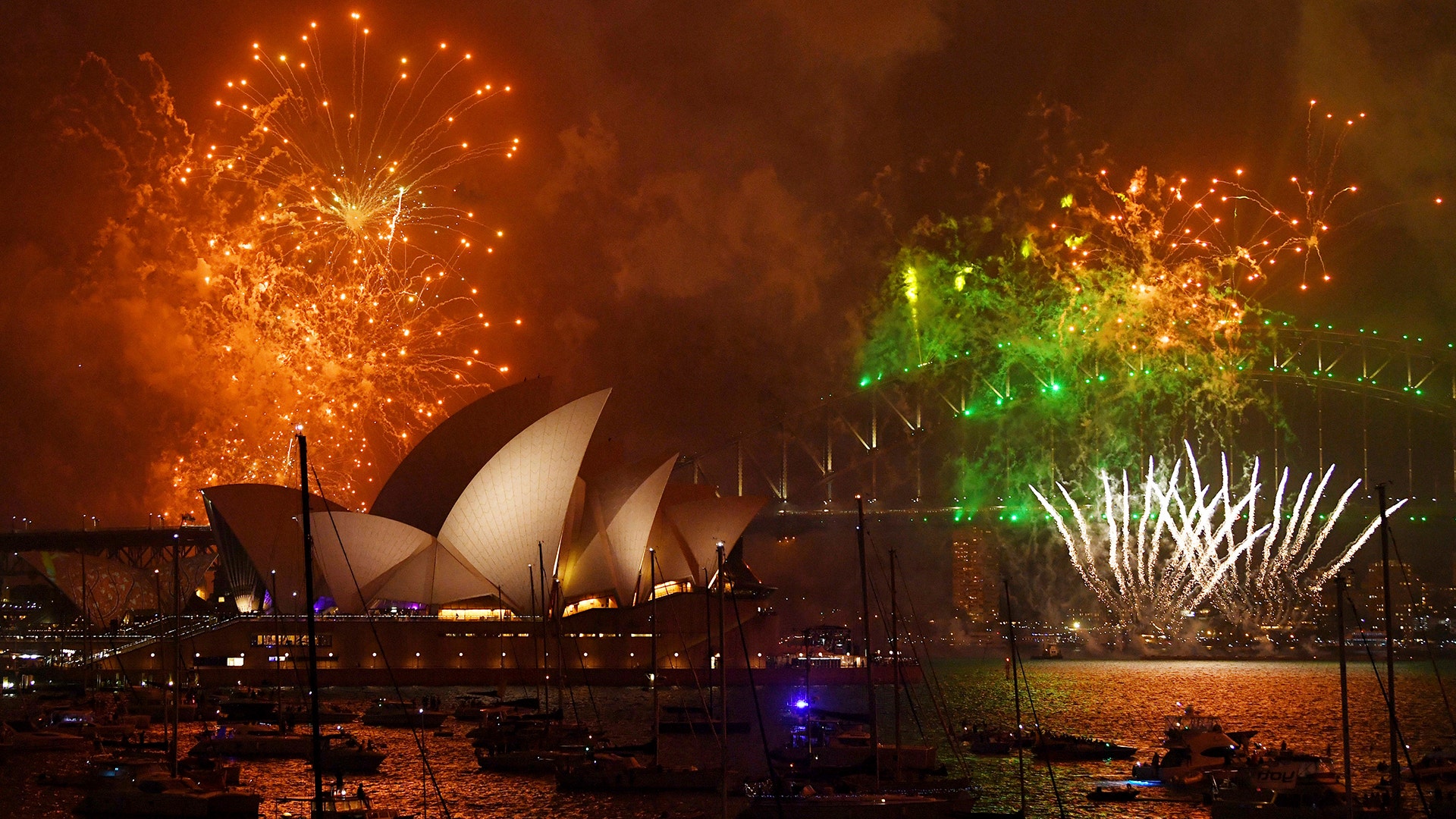 Fireworks explode over Sydney Harbour during New Year's Eve celebrations in Sydney, Australia