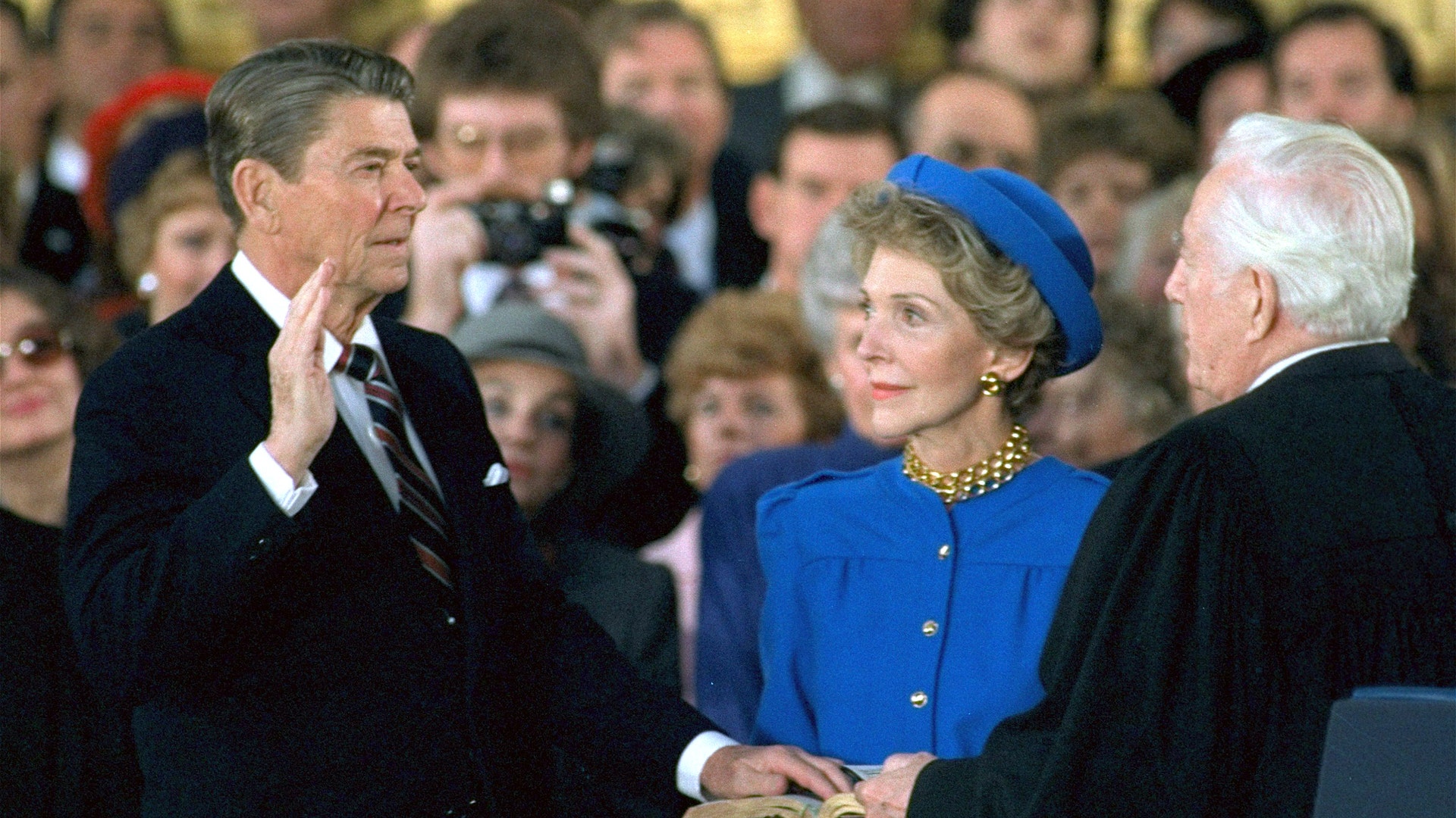 Ronald Reagan is sworn in as 40th president of the United States by Chief Justice Warren Burger beside his wife Nancy Reagan during his inaugural ceremony, on Jan. 21, 1985.