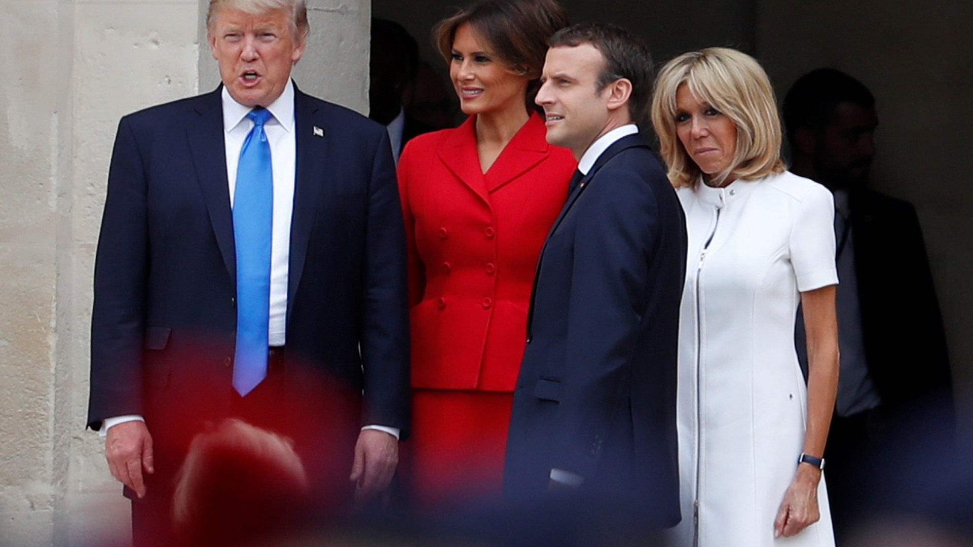 French President Emmanuel Macron and his wife Brigitte Macron, with President Donald Trump and First Lady Melania Trump in Paris