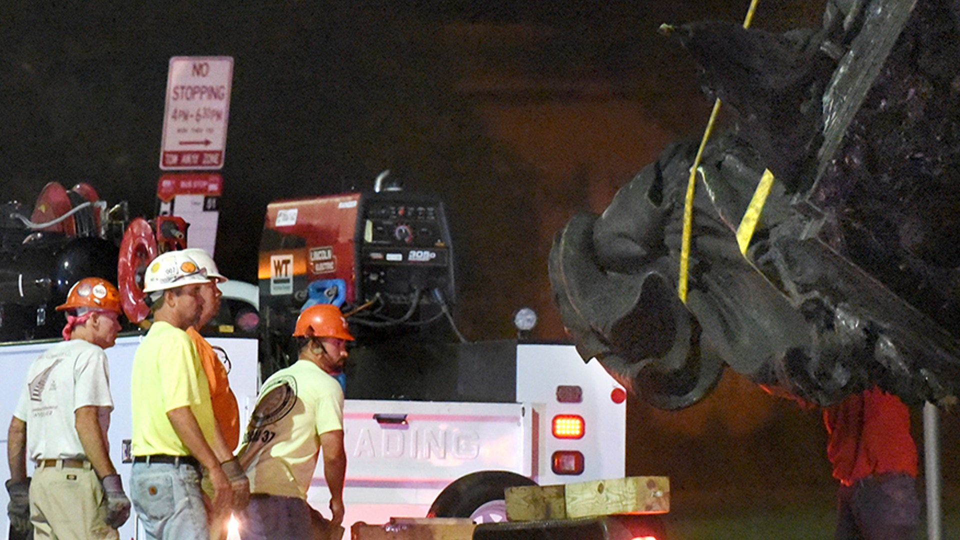 Workers hauled several monuments away, days after a white nationalist rally in Virginia turned deadly