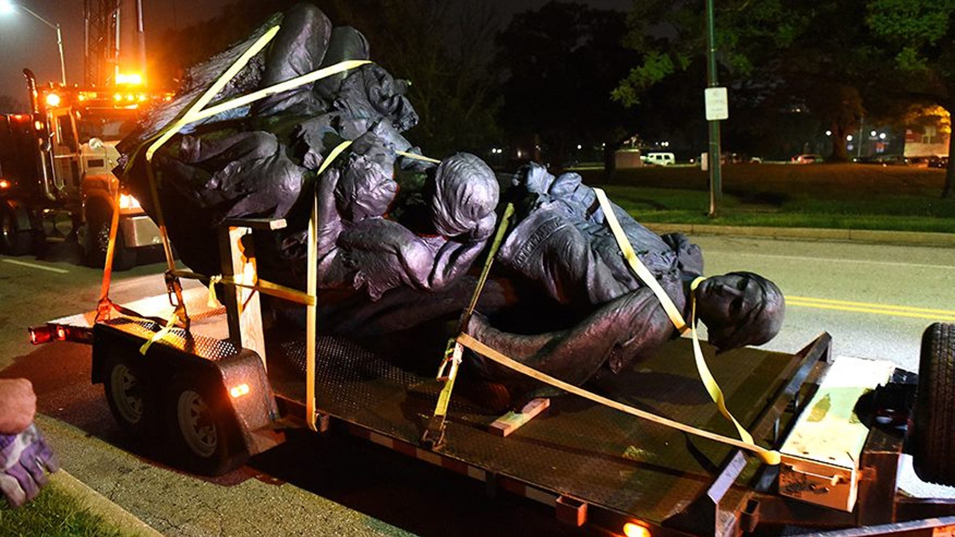 A monument dedicated to the Confederate Women of Maryland lies on a flatbed trailer early Wednesday, Aug  16, 2017