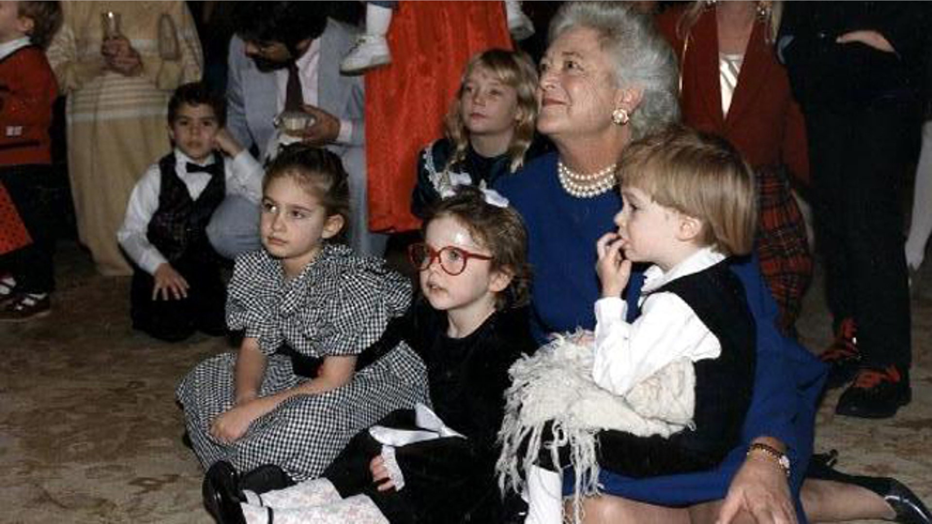 George and Barbara Bush through the years