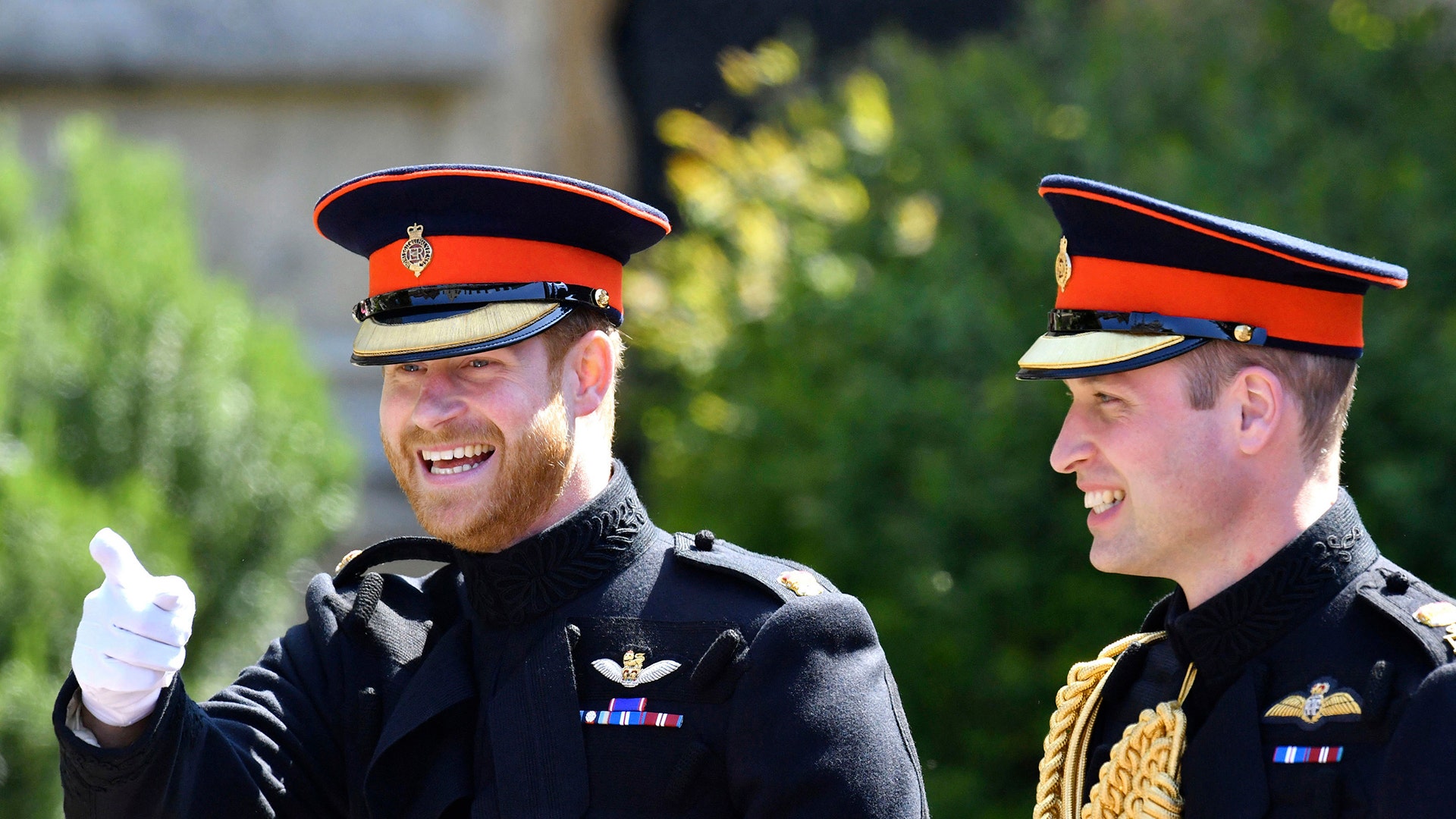Prince Harry walks with his best man, Prince William the Duke of Cambridge, as they arrive for the the wedding ceremony