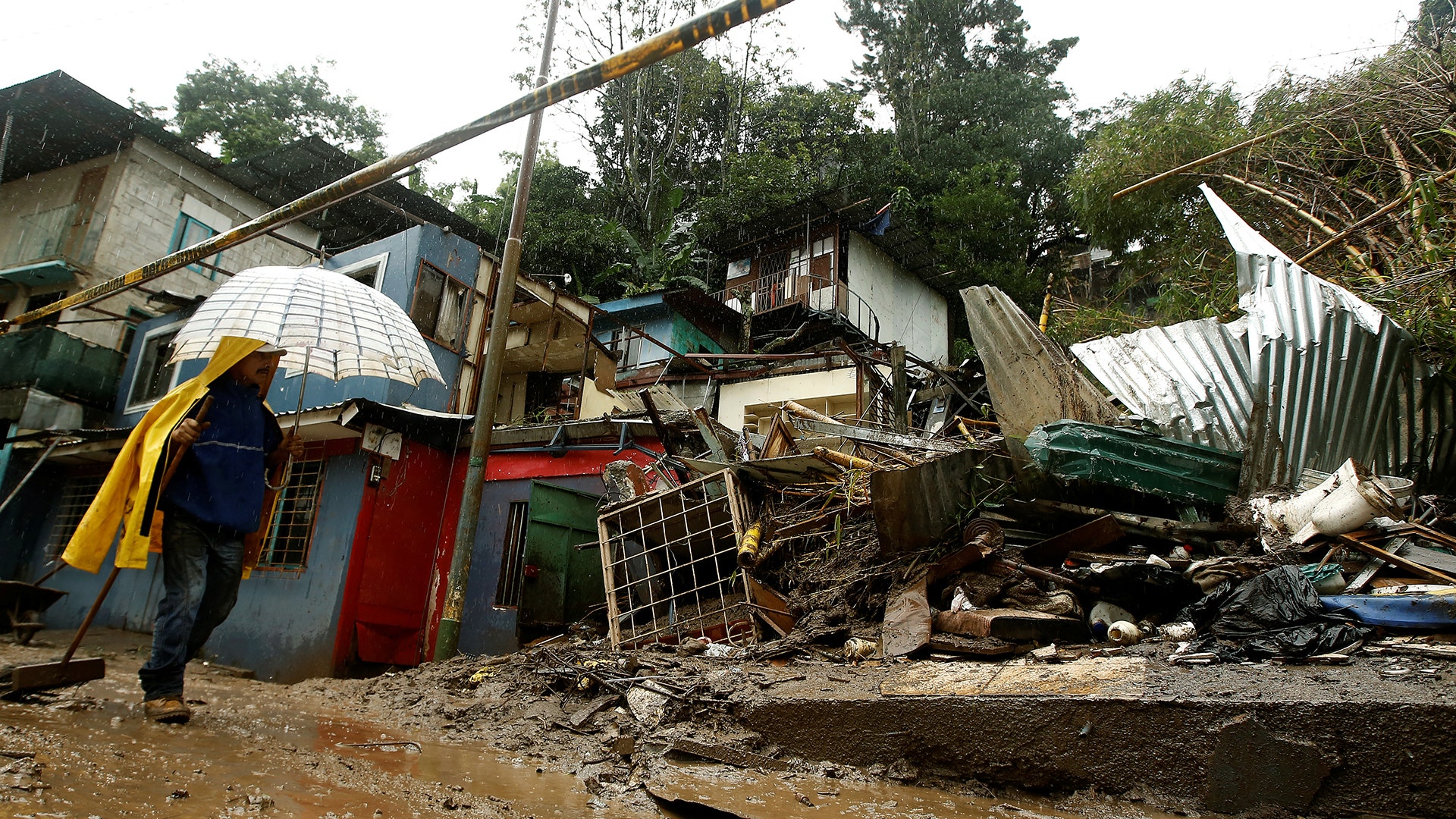 Houses damaged by a mudslide during heavy rains of Tropical Storm Nate that affects the country in San Jose, Costa Rica, October 5, 2017