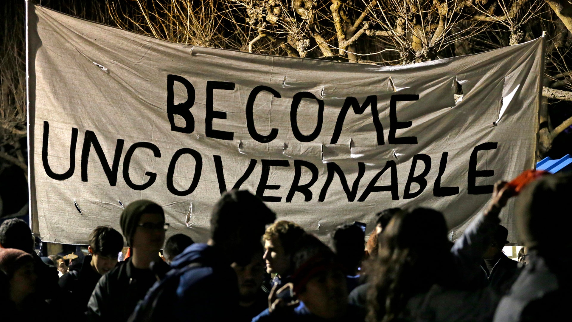 Protestors against a scheduled speaking appearance by polarizing Breitbart News editor Milo Yiannopoulos 