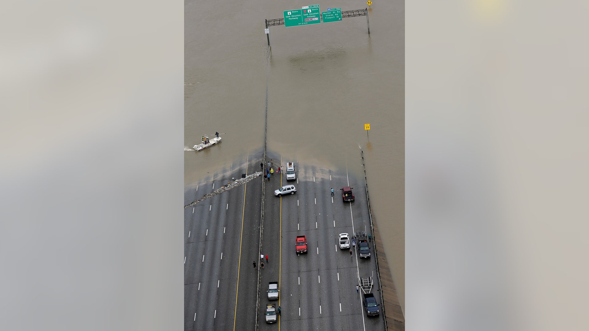 Interstate 10 is closed due to floodwaters from Tropical Storm Harvey Tuesday, in Houston
