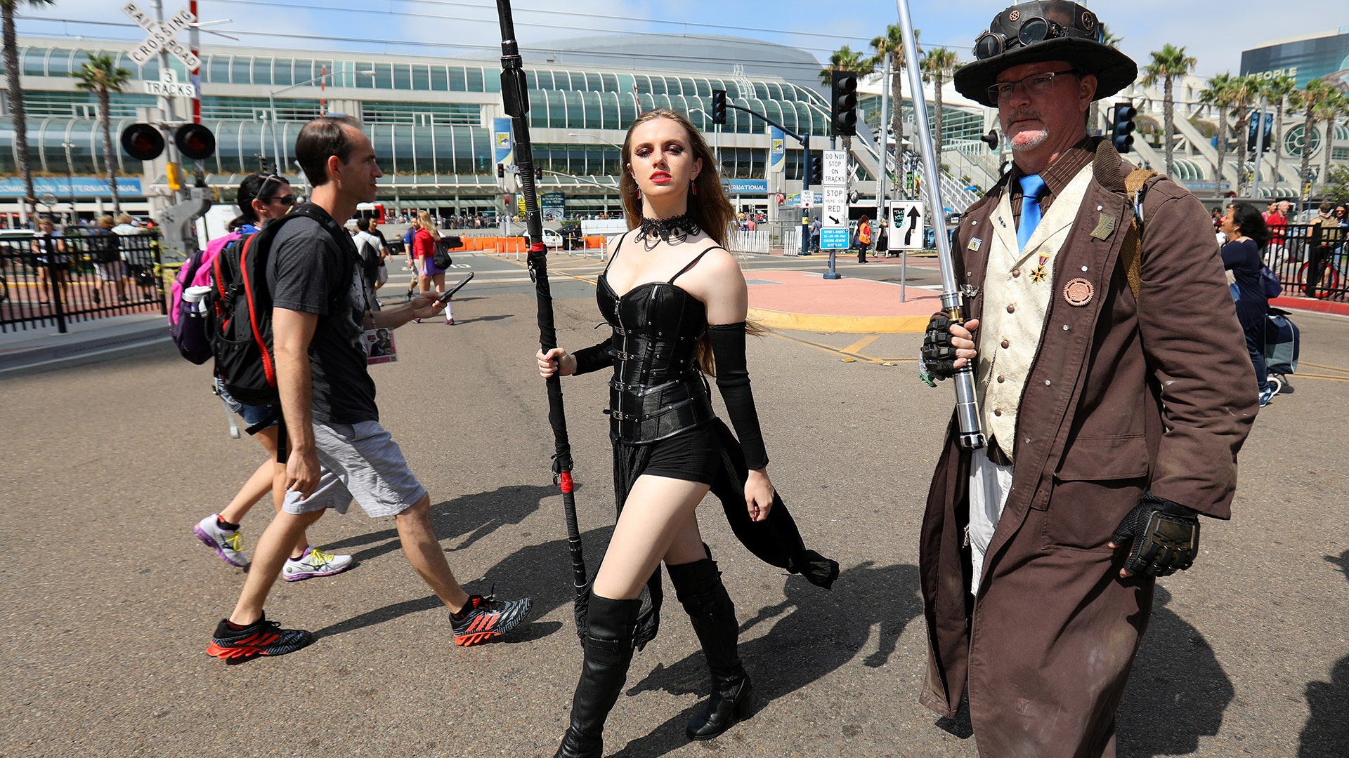 Attendees arrive at Comic-Con International in San Diego, California, July 21, 2017