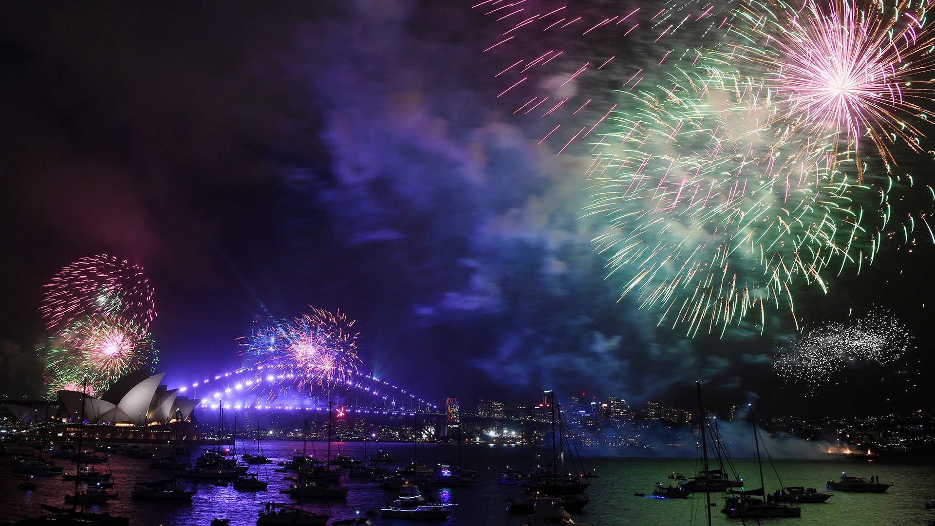 Fireworks explode over Sydney Harbour during New Year's Eve celebrations in Sydney