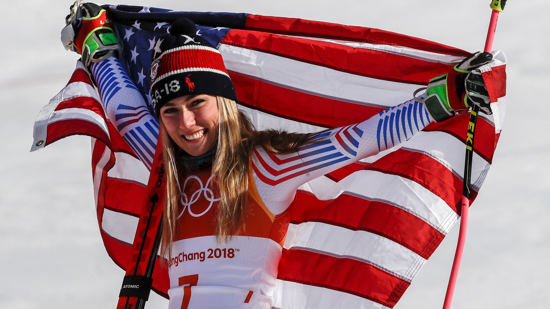Mikaela Shiffrin of the United States celebrates her gold medal in the women's giant slalom at the 2018 Winter Olympics