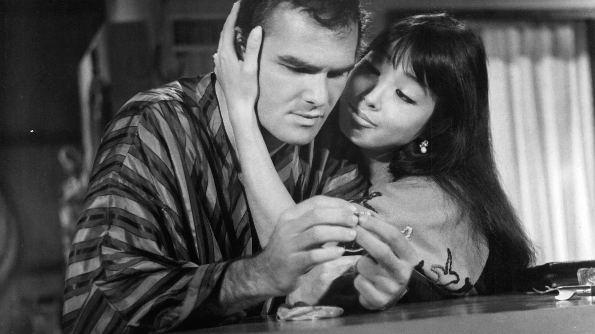 Miko Mayama and Burt Reynolds in a scene of the 1969 film 'Impasse.'