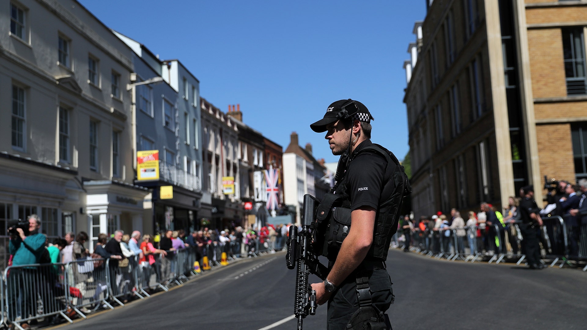 Armed police officers patrol the streets near Windsor Castle in Windsor, Britain, May 17, 2018