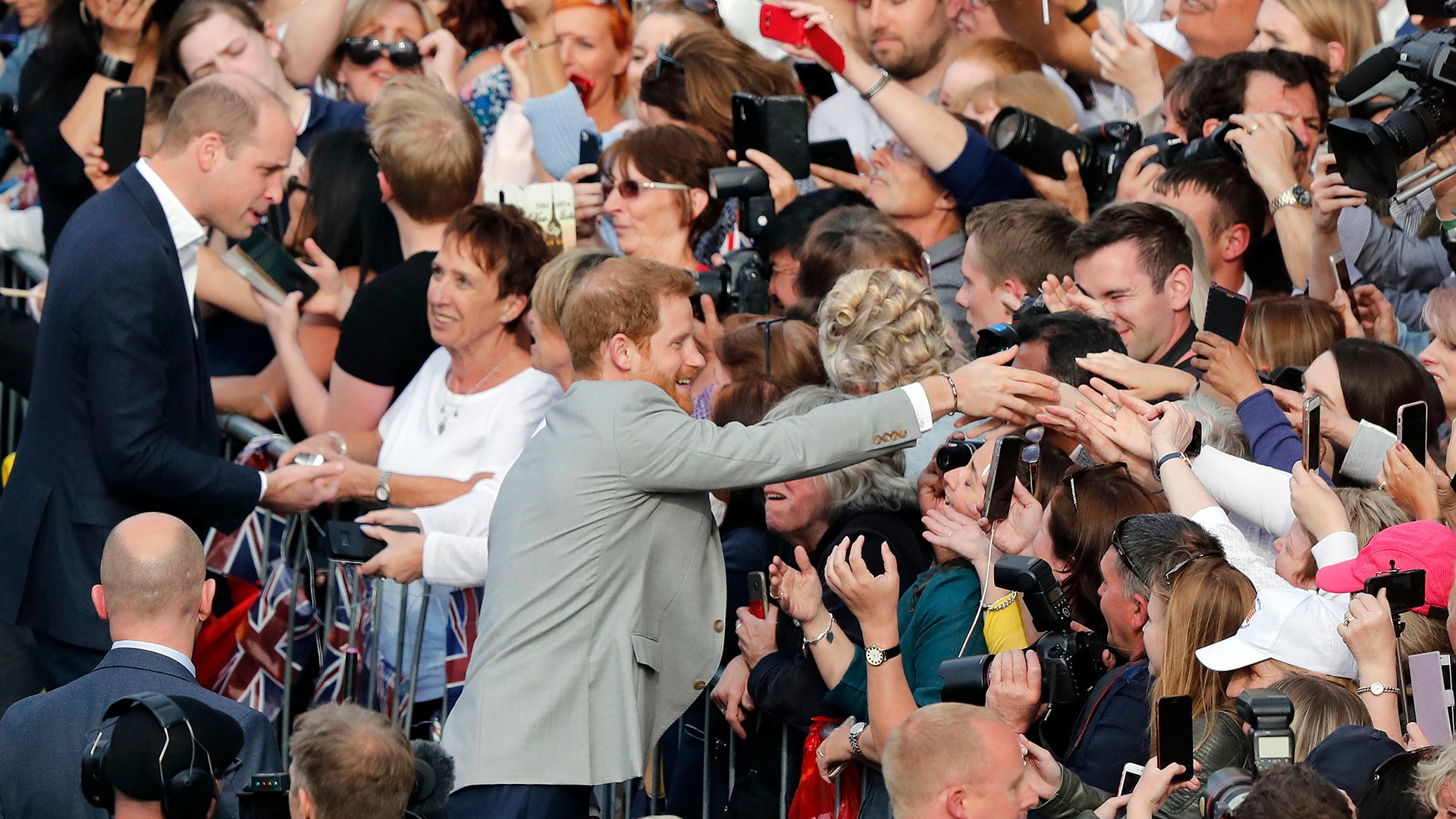 Britain's Prince William and Prince Harry greet crowds in Windsor, May 18, 2018