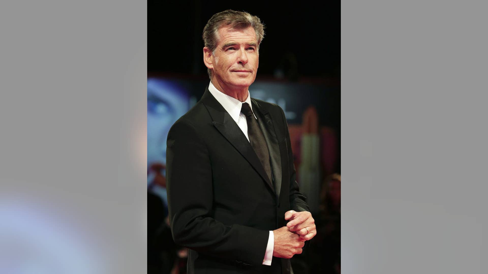 Posing on the red carpet at the 69th Venice Film Festival in September 2, 2012.