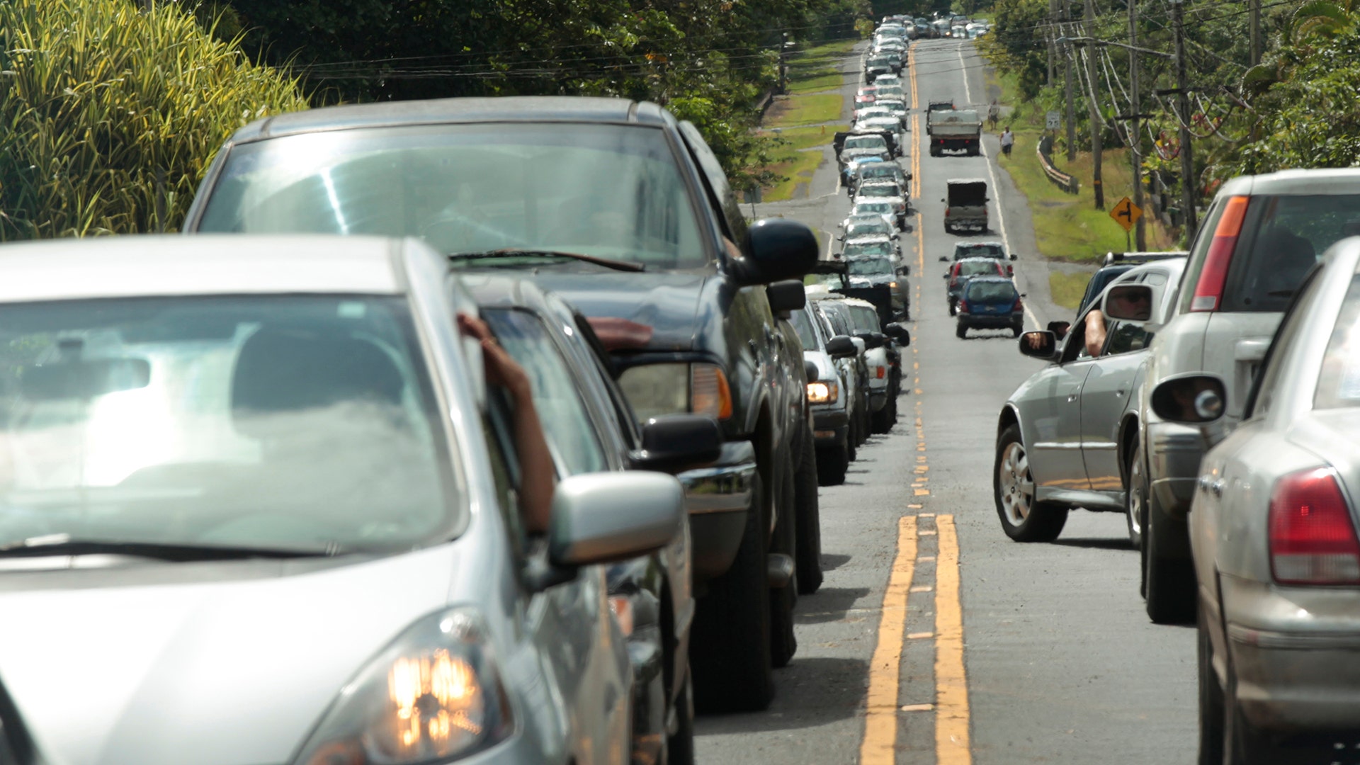 Residents wait to return to their homes in the Leilani Estates to gather vital belongings and animals in Pahoa, Hawaii, May 6, 2018