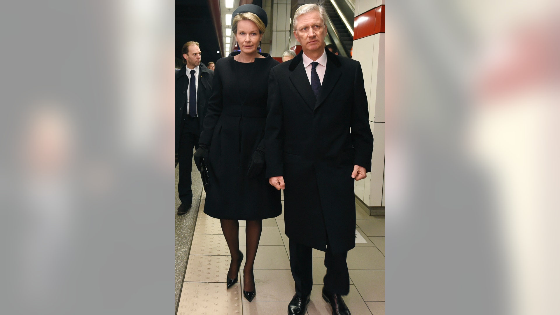 King Philippe and Queen Mathilde led somber ceremonies at Brussels airport and the Maelbeek metro station.