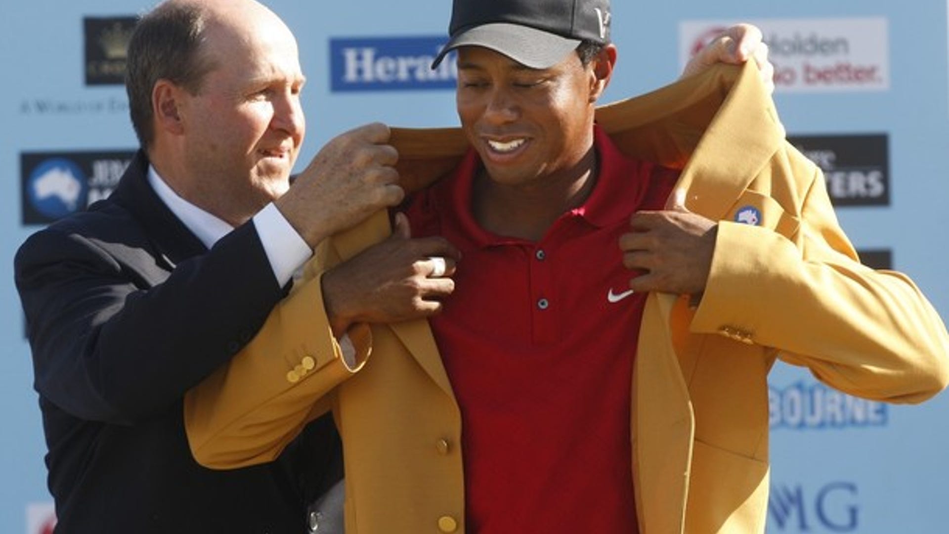 Tiger Woods Gets Jacket 