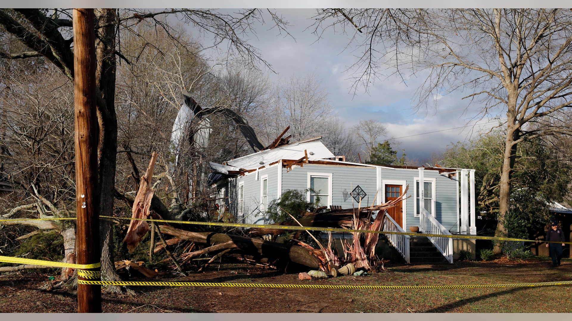 Debris lies on the ground at the home of Ellen Green and Johnny Green on Sunday, Jan. 22, 2017 in Opelika, Ala.