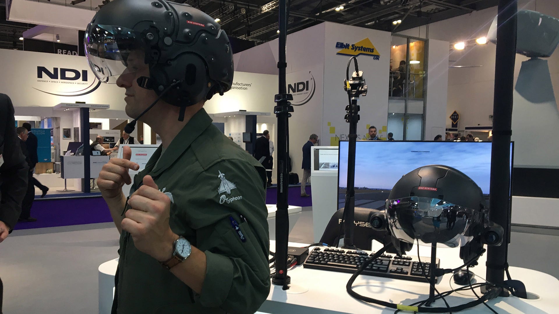 Helicopter pilot wearing a full tech gear.