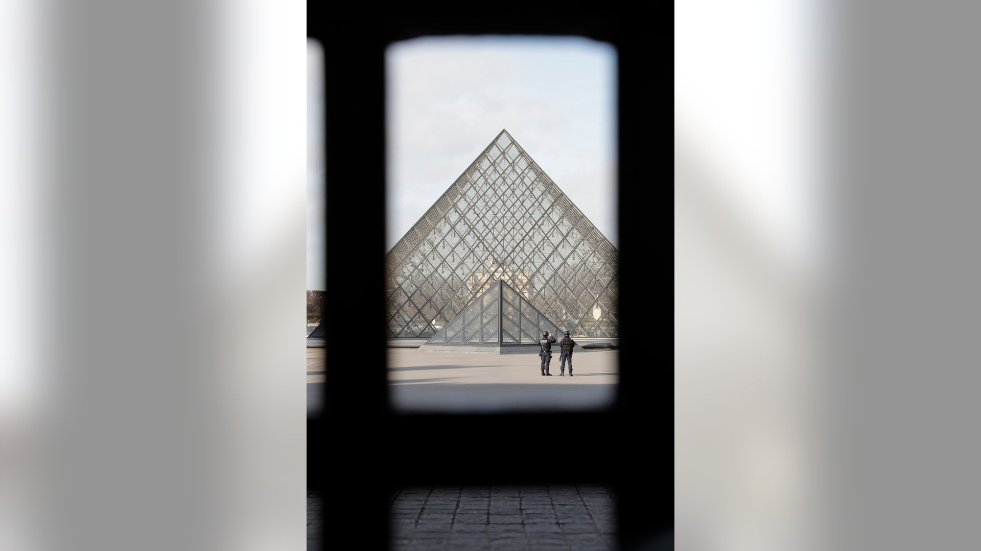 French police secure the site near the Louvre Pyramid in Paris, France, February 3, 2017.