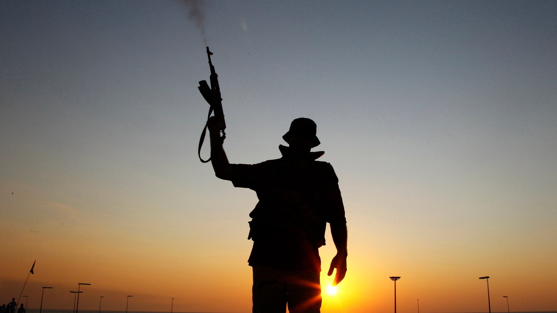 LibyanRebelWithGunSihlouette