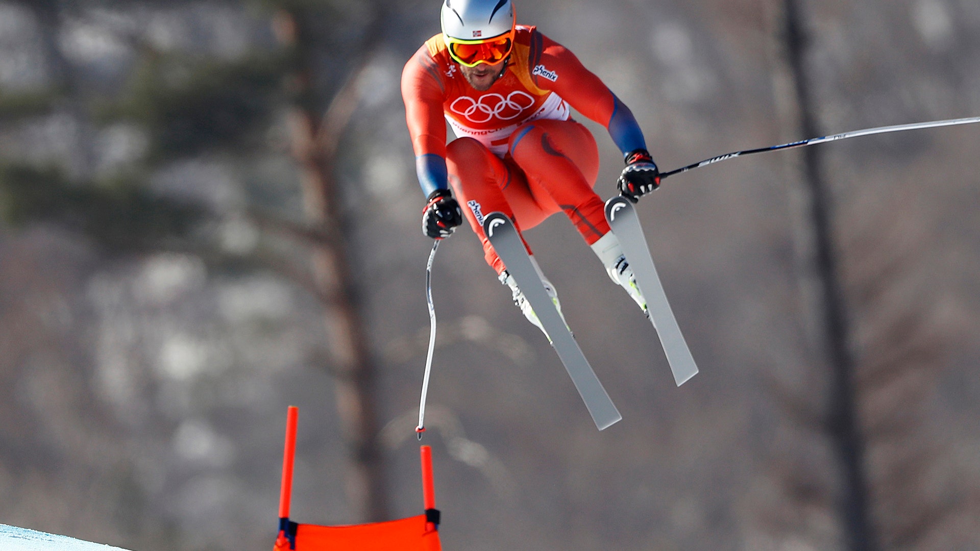 Aksel Lund Svindal of Norway winning the gold medal in the men's downhill at the 2018 Winter Olympics