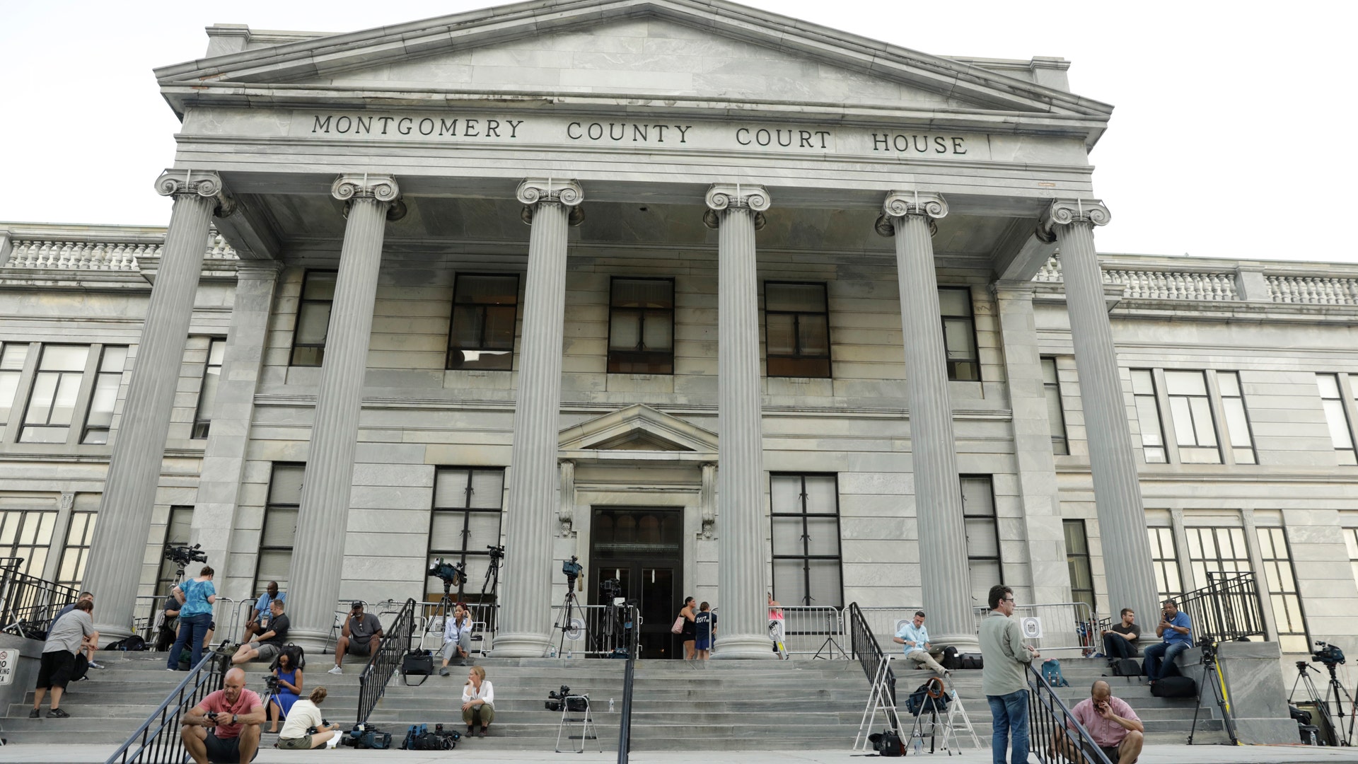Members of the media on the steps of the Montgomery County Court House after closing arguments in Bill Cosby's trial on June 12, 2017.