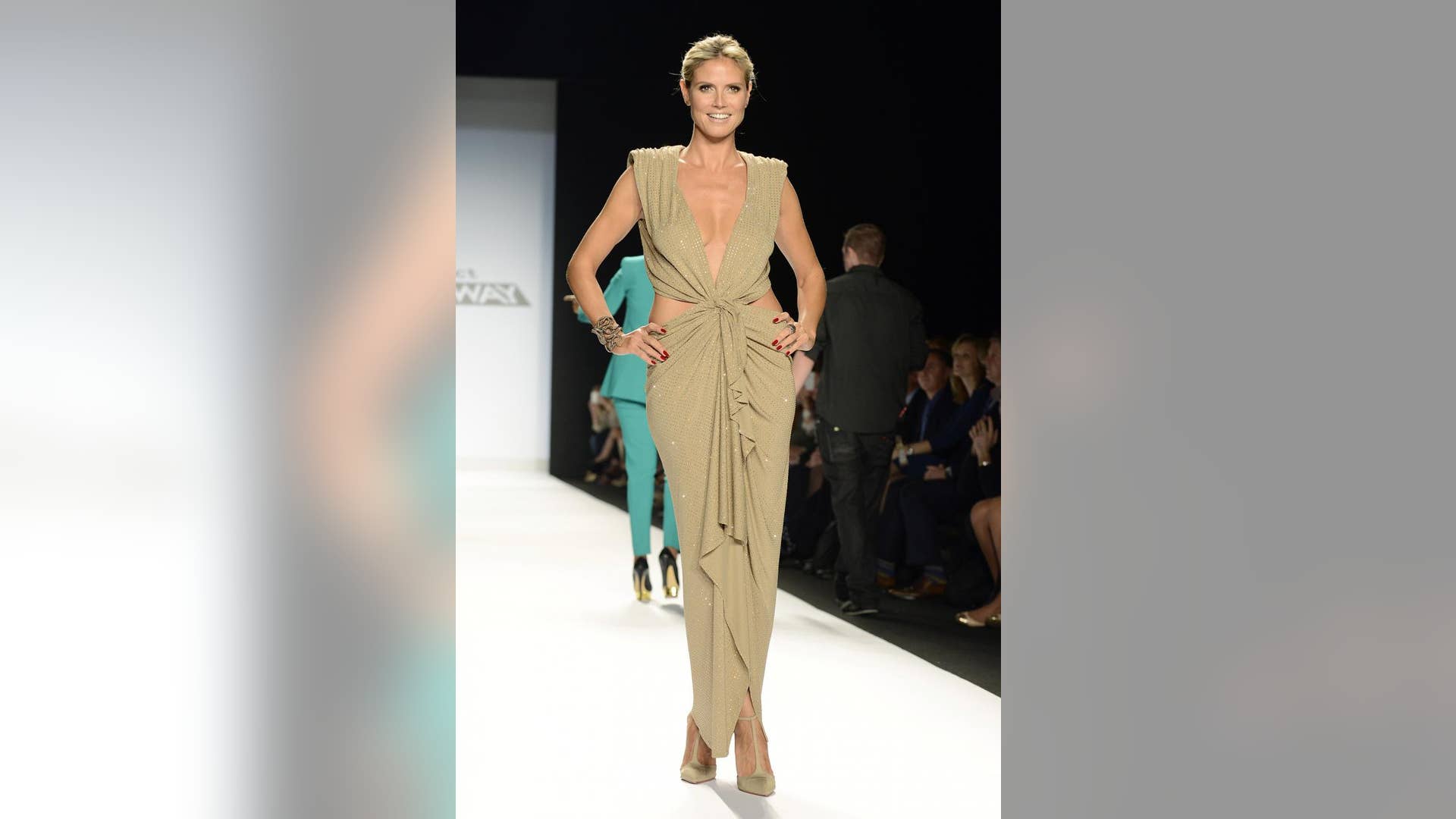 Posing before Project Runway show during New York Fashion Week, 2012