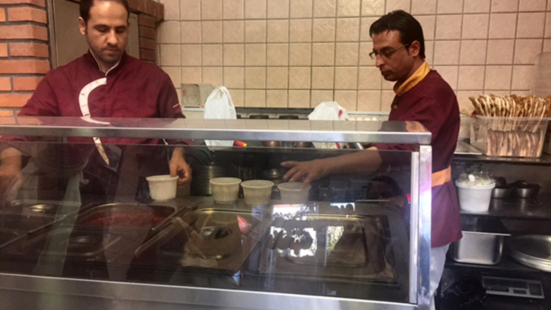 Local Tehran bakers prepare the traditional wheat and meat porridge breakfast known as Hakeem