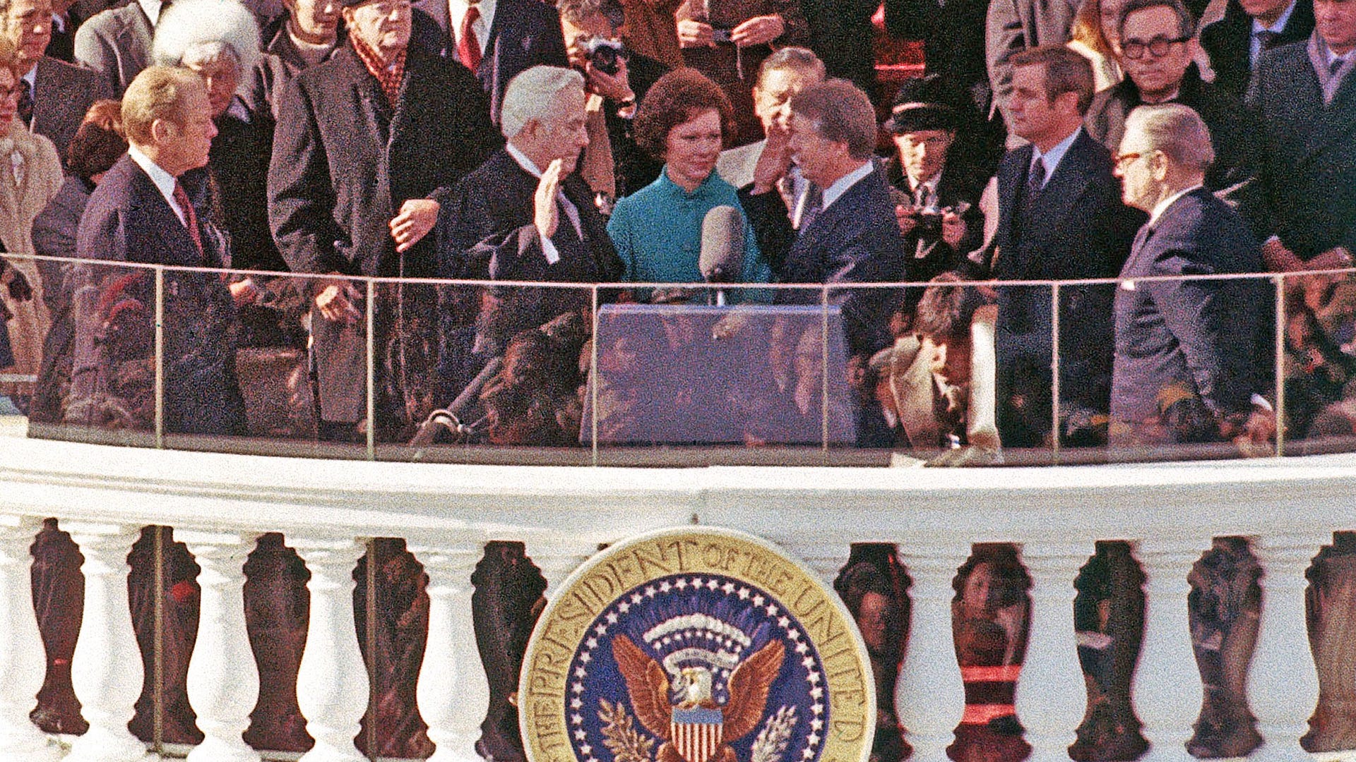 Jimmy Carter takes oath of office from U.S. Supreme Court Chief Justice Warren Burger, wife Rosalynn Carter holds the Bible on Jan. 20, 1977.