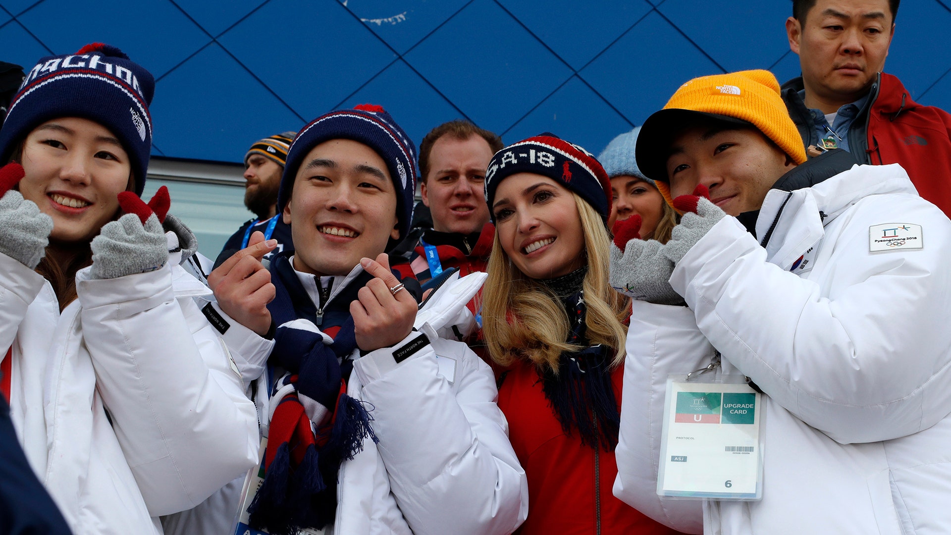 South Korean athletes pose for a photograph with Ivanka Trump