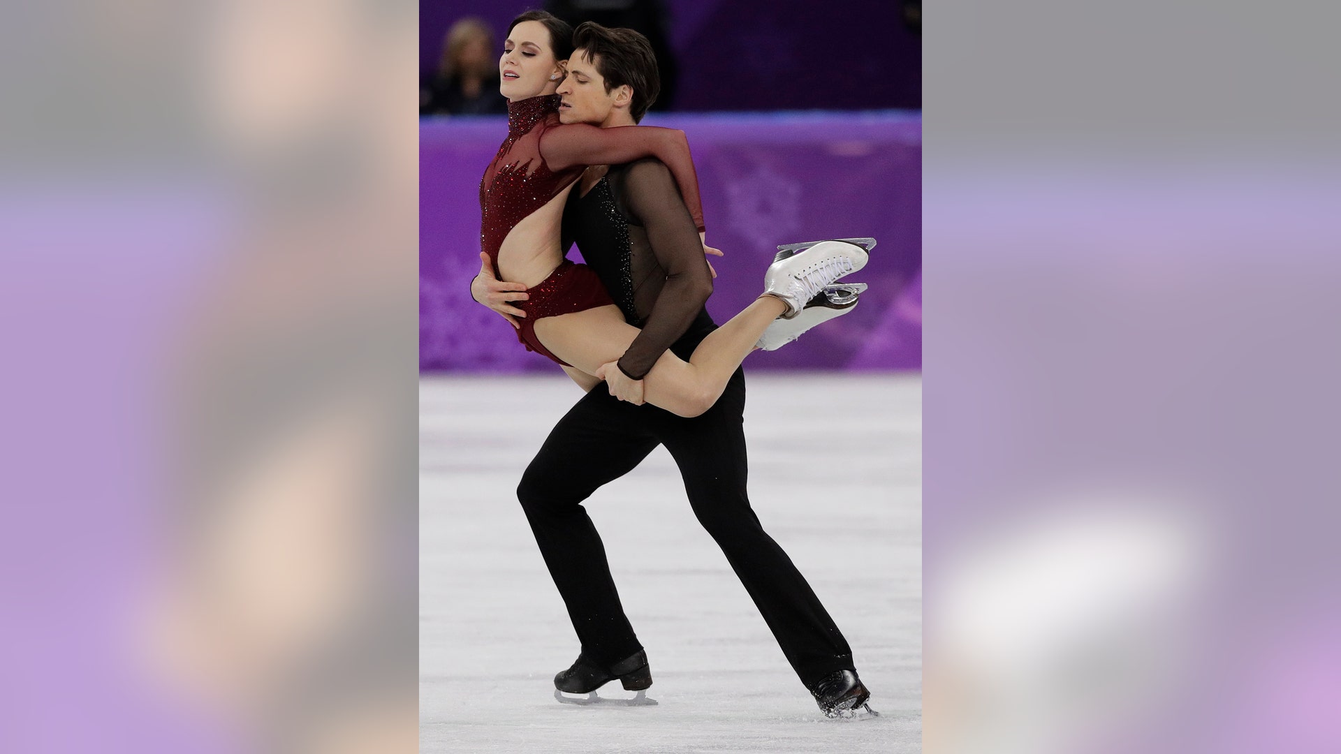 Tessa Virtue and Scott Moir of Canada perform during the ice dance, free dance figure skating final at the Winter Olympics