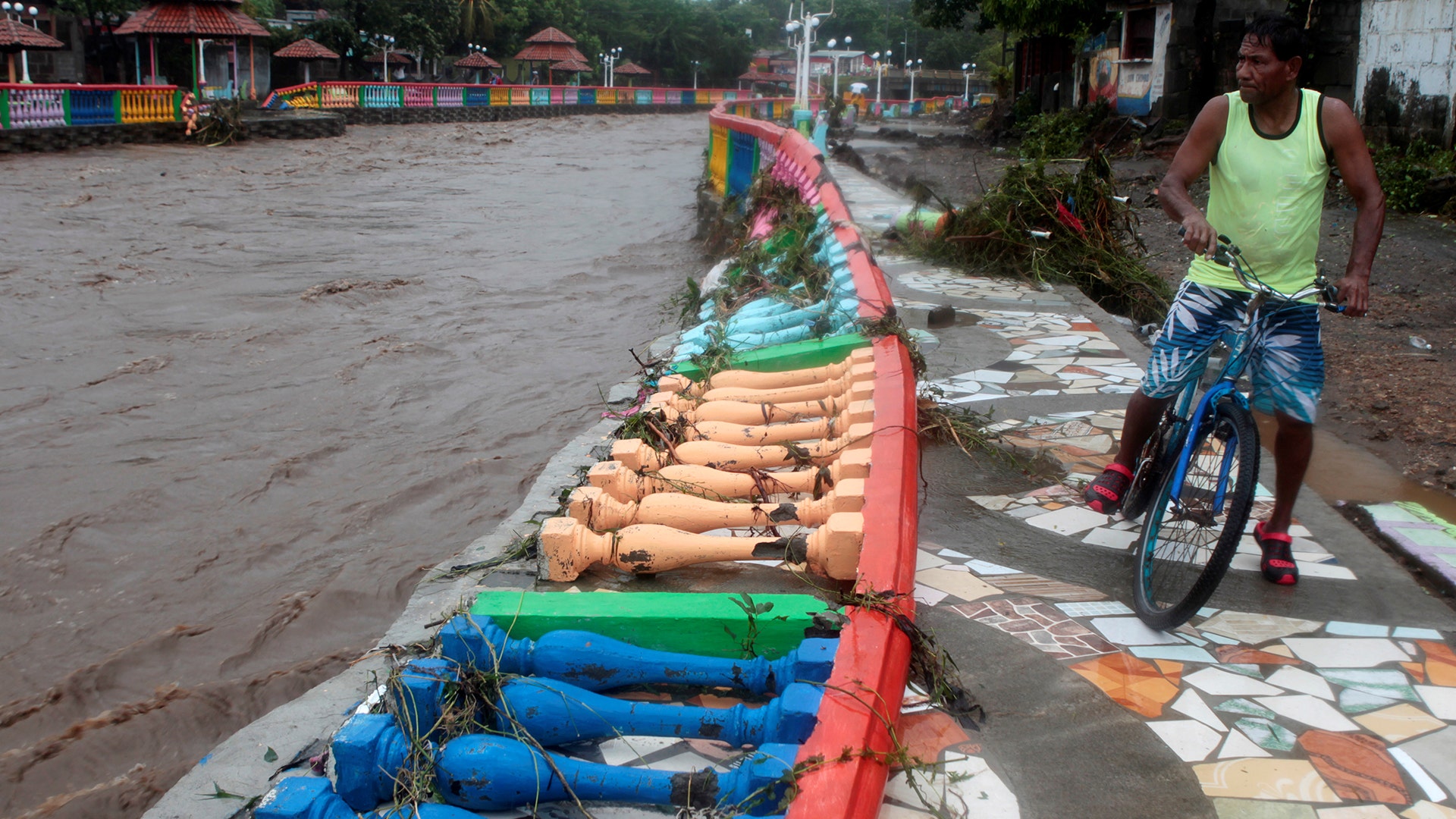 A resident look at damage caused by heavy rains of Tropical Storm Nate on Masachapa river in Managua, Nicaragua October 5,2017