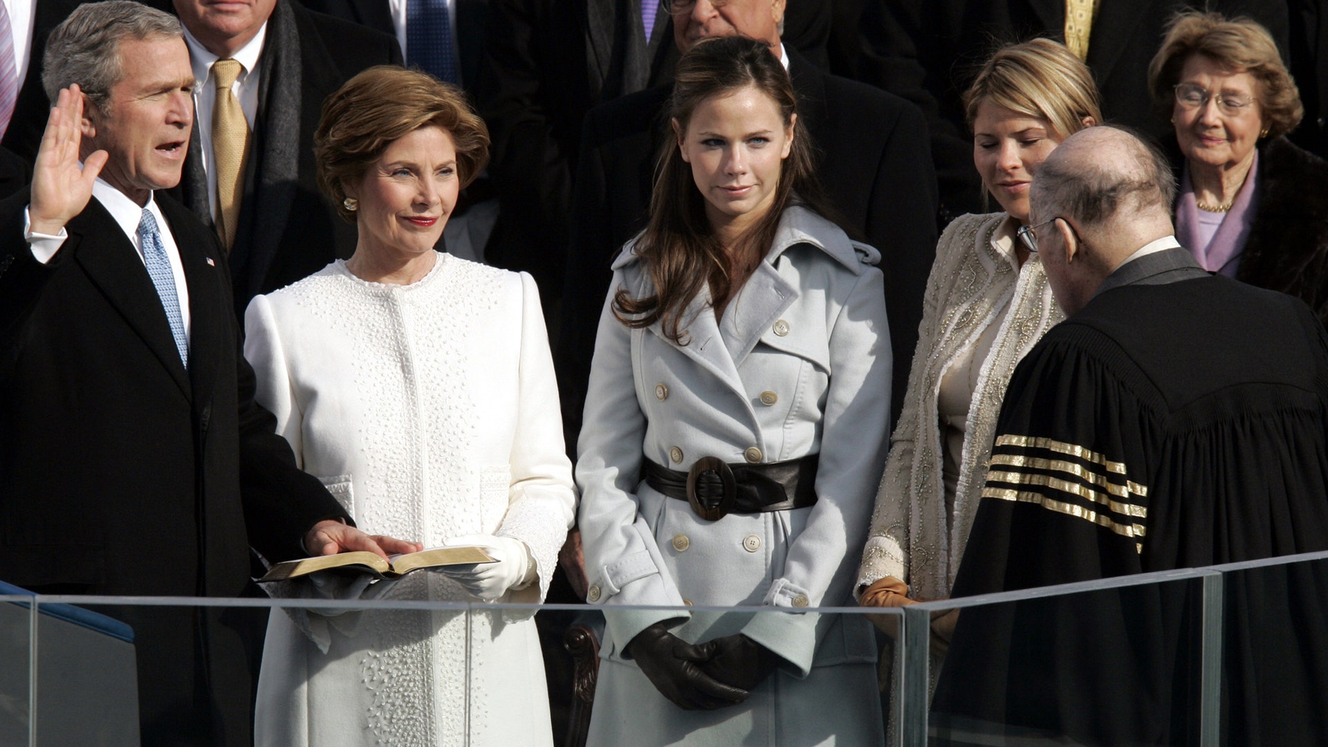 President Bush receives the oath of office from Chief Justice William Rehnquist, right, at the US Capitol in Washington, Jan. 20, 2005. 