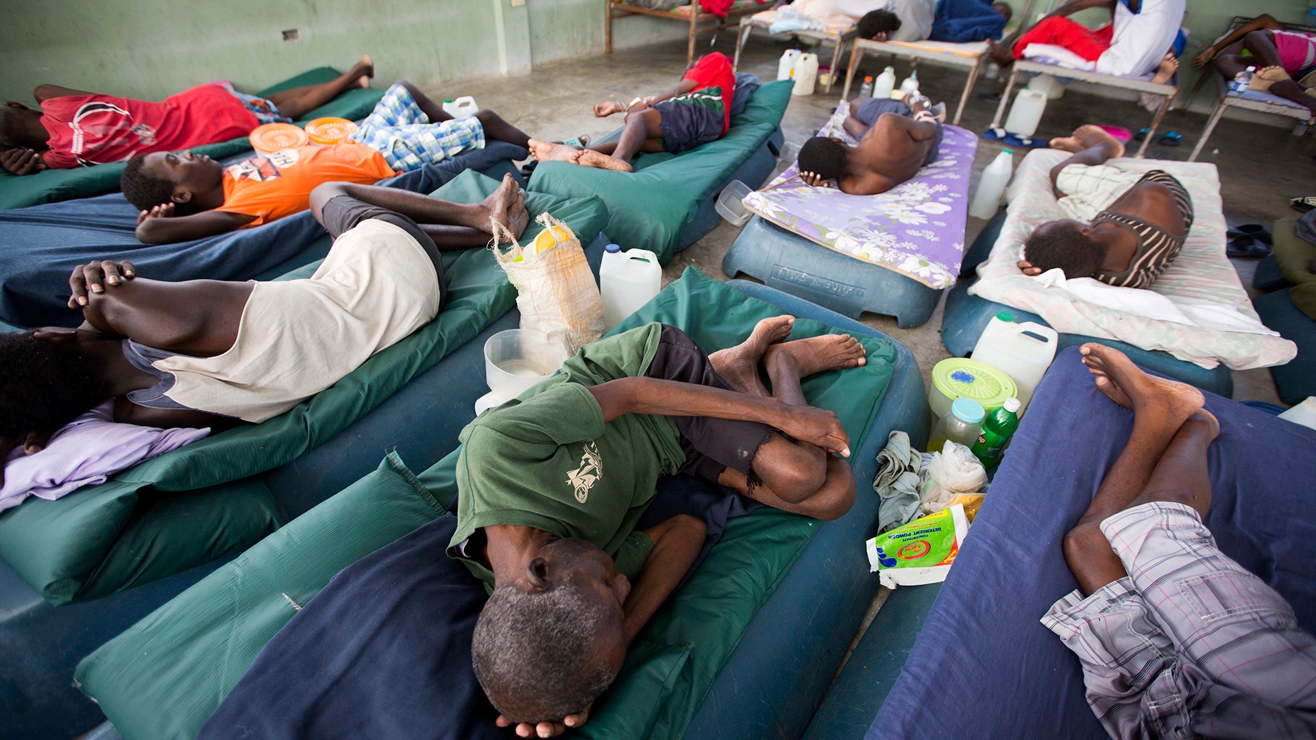 Sick prisoners rest in the infirmary at the National Penitentiary in downtown Port-au-Prince, Haiti.