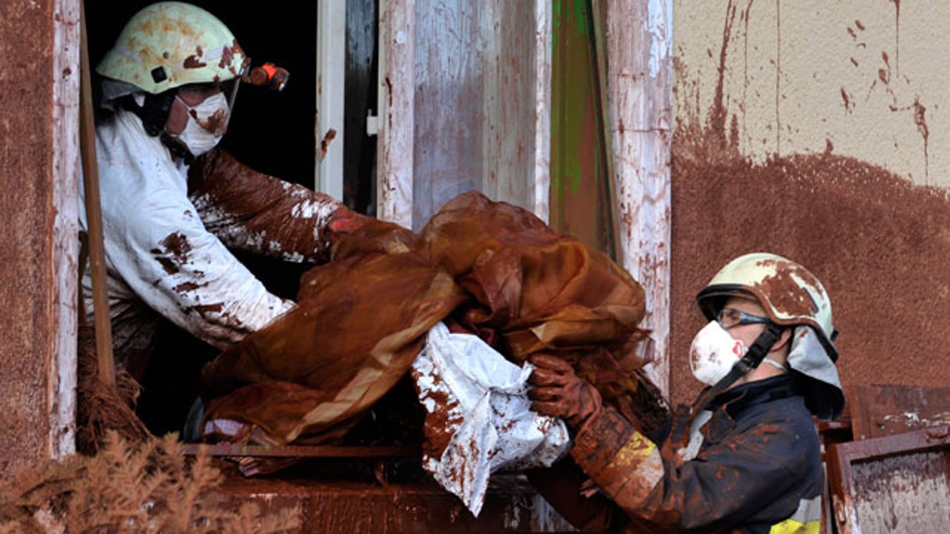 Firefighters Help Village Affected by Hungary Sludge Flood