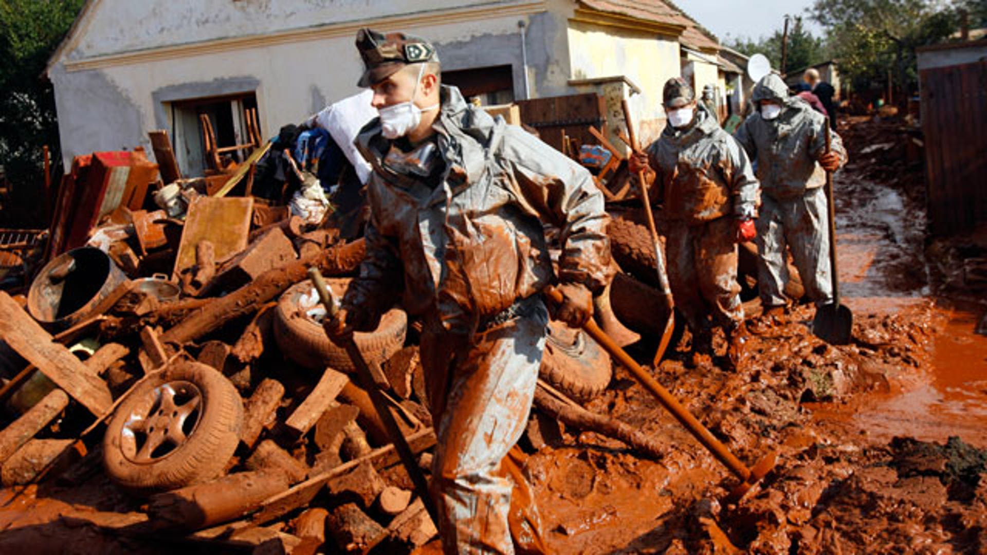 Hungarian Soldiers Help in Clean Up Process