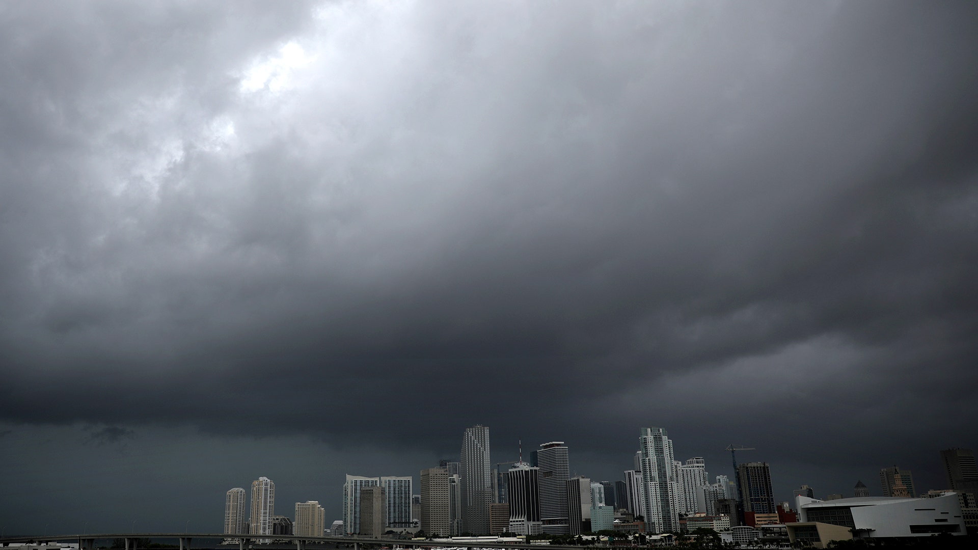 Dark clouds are seen over Miami's skyline prior to the arrival of Hurricane Irma