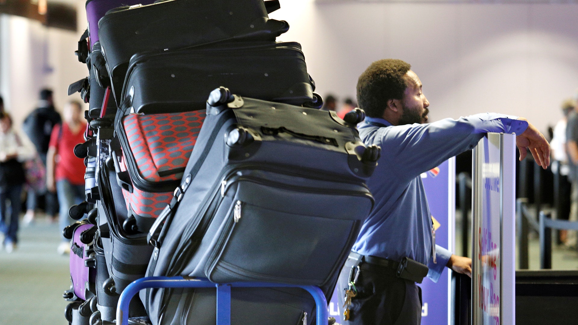 Luggage is seen waiting to be checked at Orlando International Airport 