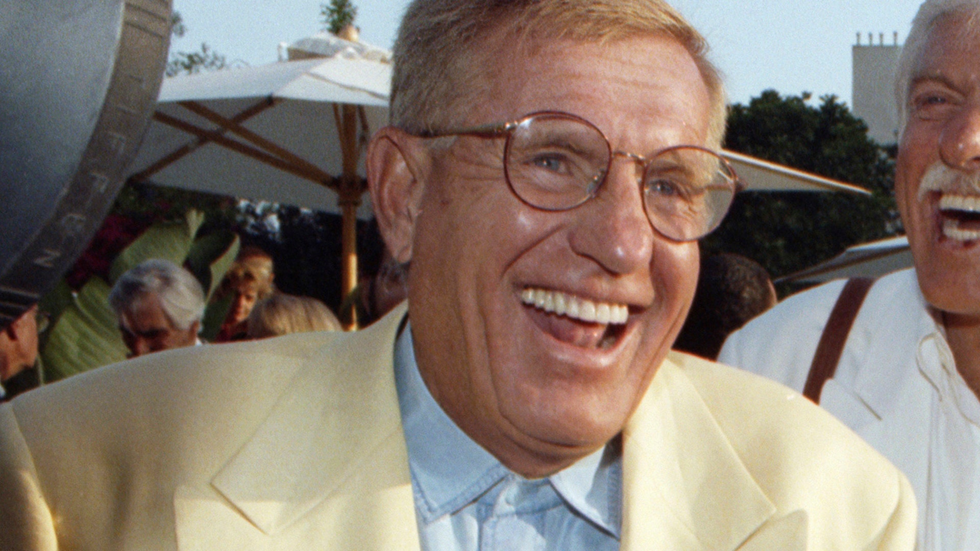 In this Aug. 25, 1992 file photo, Jerry Van Dyke, left, and his brother, Dick, laugh during a party in Los Angeles. Manager said Saturday, Jan. 6, 2018, that Jerry Van Dyke, 'Coach' star and younger brother of comedian Dick Van Dyke, has died in Arkansas at 86. Manager, John Castonia, said Van Dyke died Friday at his ranch in Hot Spring County. His wife, Shirley Ann Jones, was by his side.