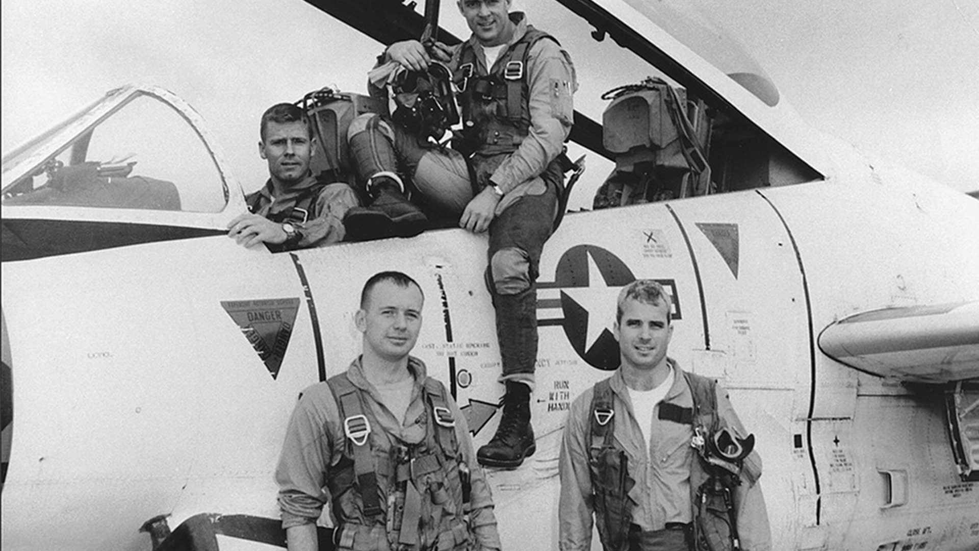 John McCain, (front, right) with his squadron in 1965. 