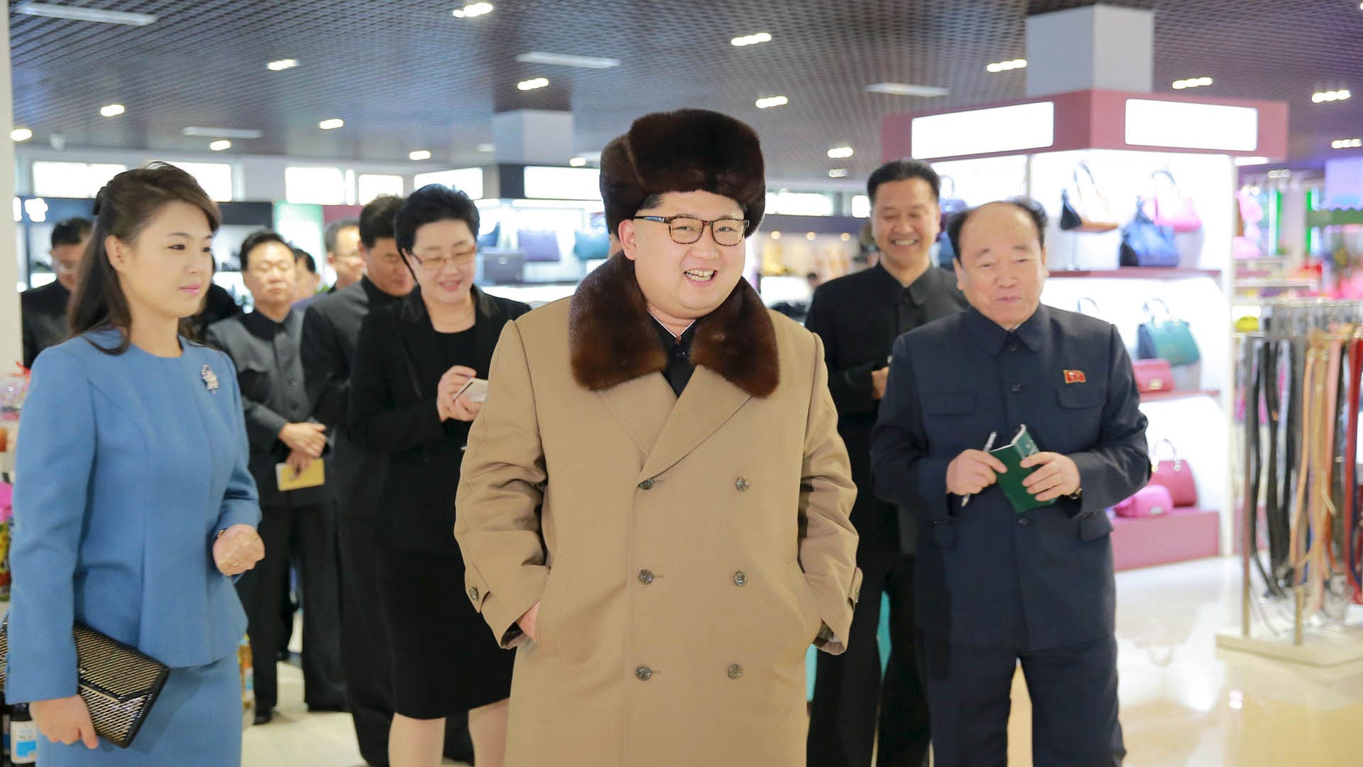 North Korea leader Kim Jong-Un, with his wife Ri Sol-Ju, gives field guidance at the newly built Mirae Shop and Health Complex