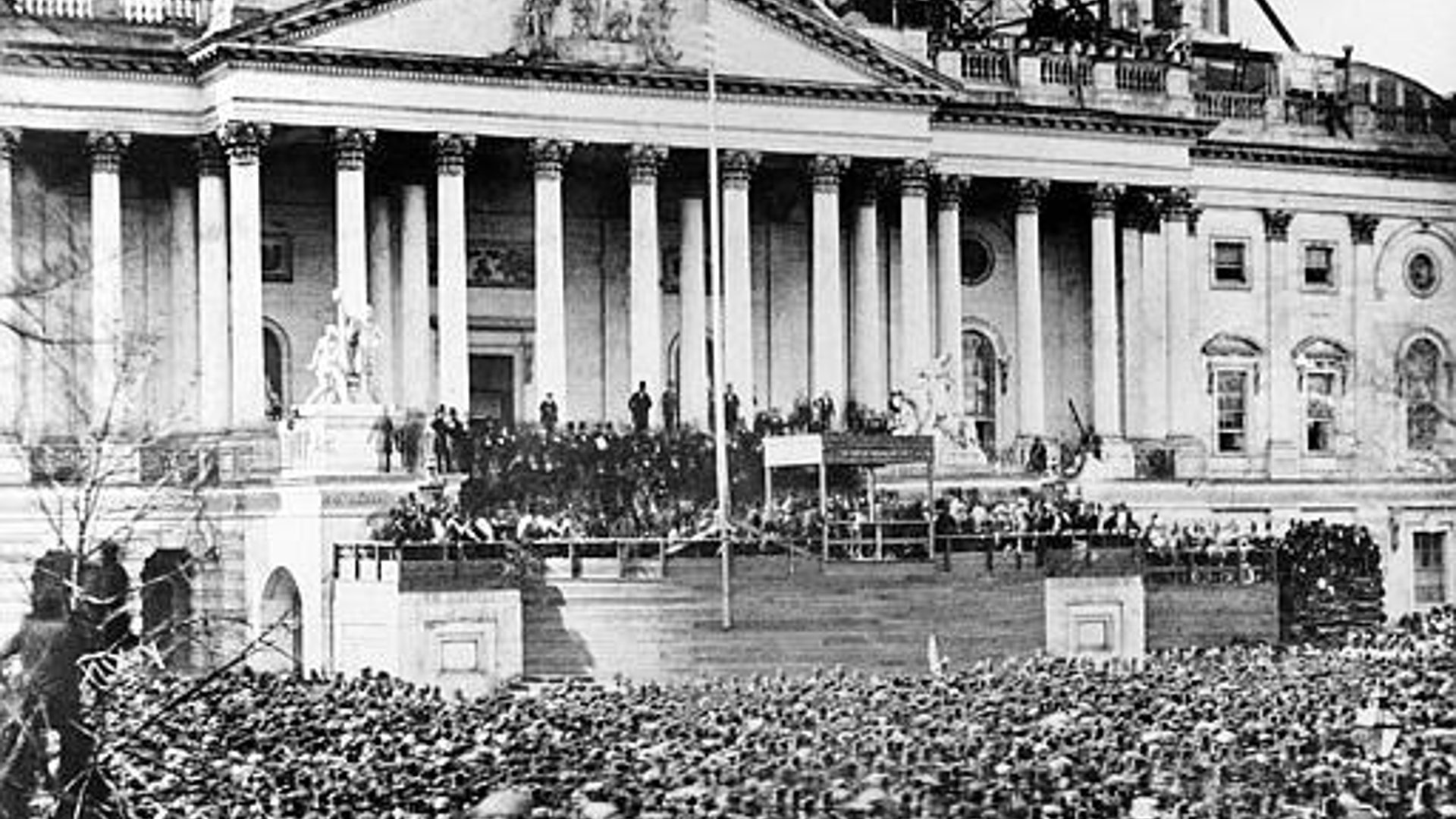 U.S. President Abraham Lincoln stands under cover at center of Capitol steps during his inauguration in Washington, D.C., March 4, 1861.