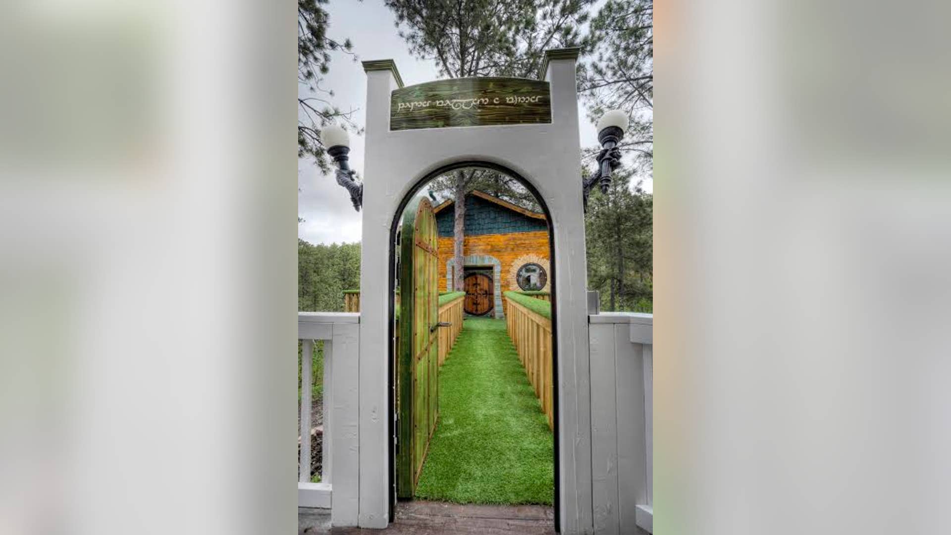 Elfish scroll welcomes guests.