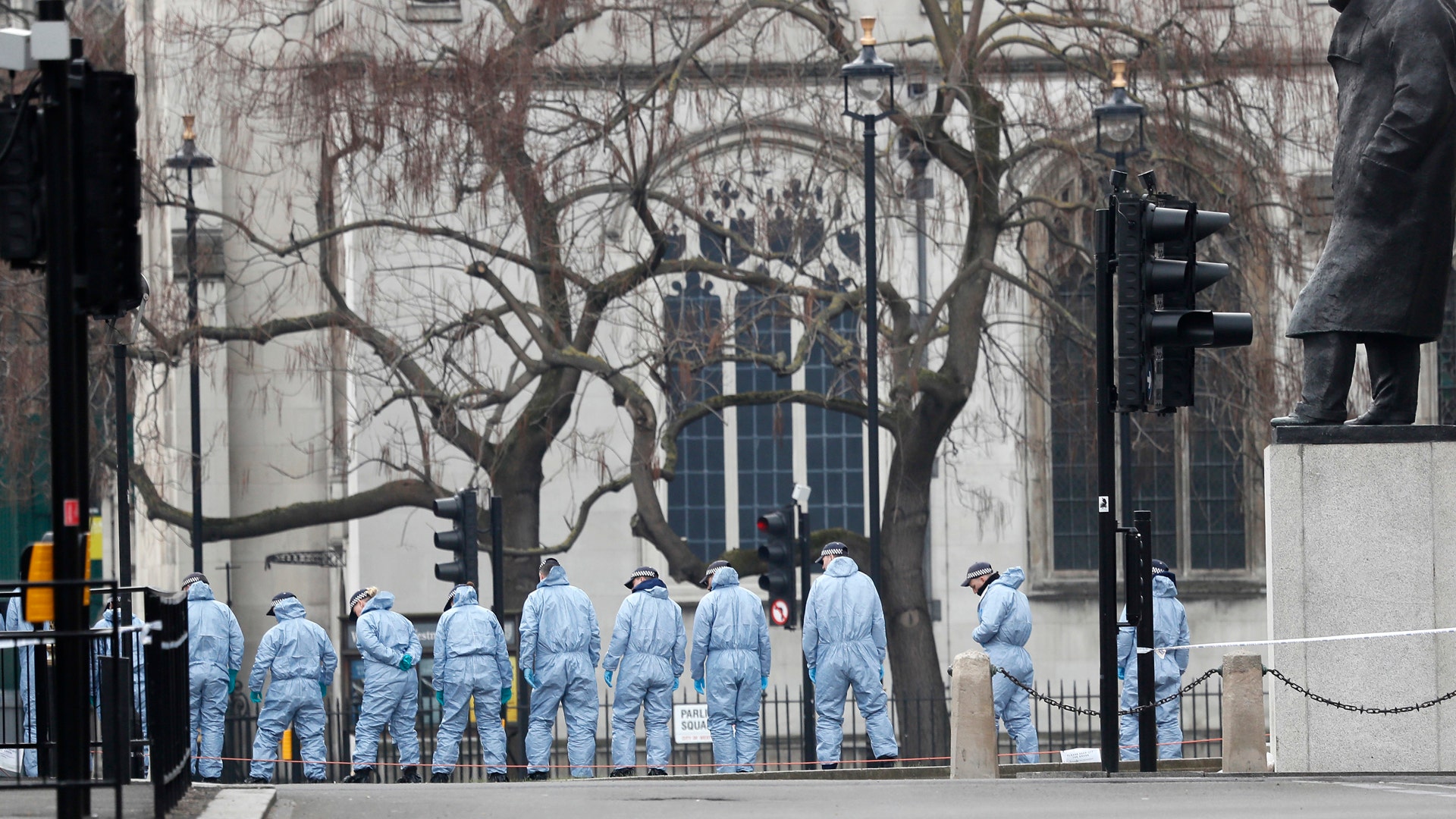 Police forensic officers work in Parliament Square in London, March 23, 2017.