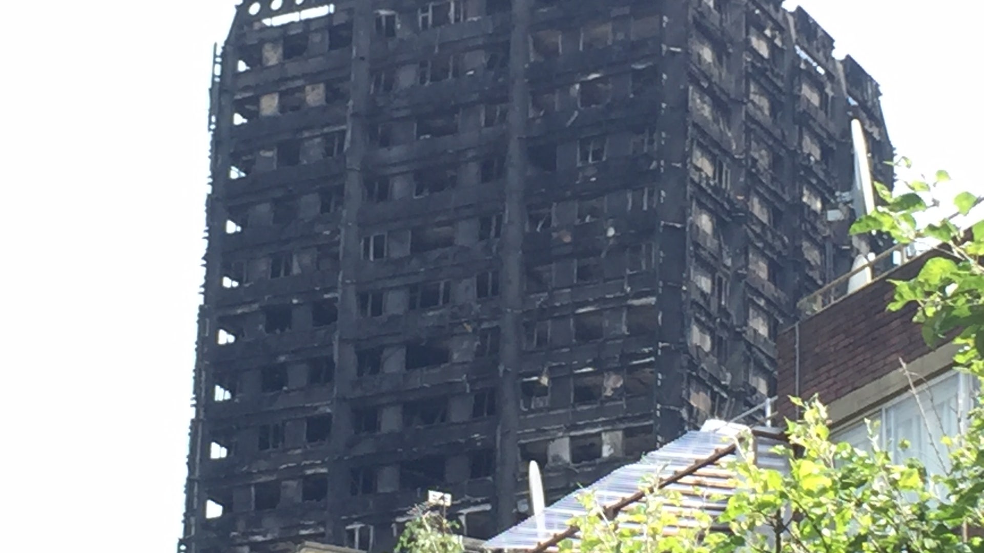 The shell of the London tower stands as reminder to government failures