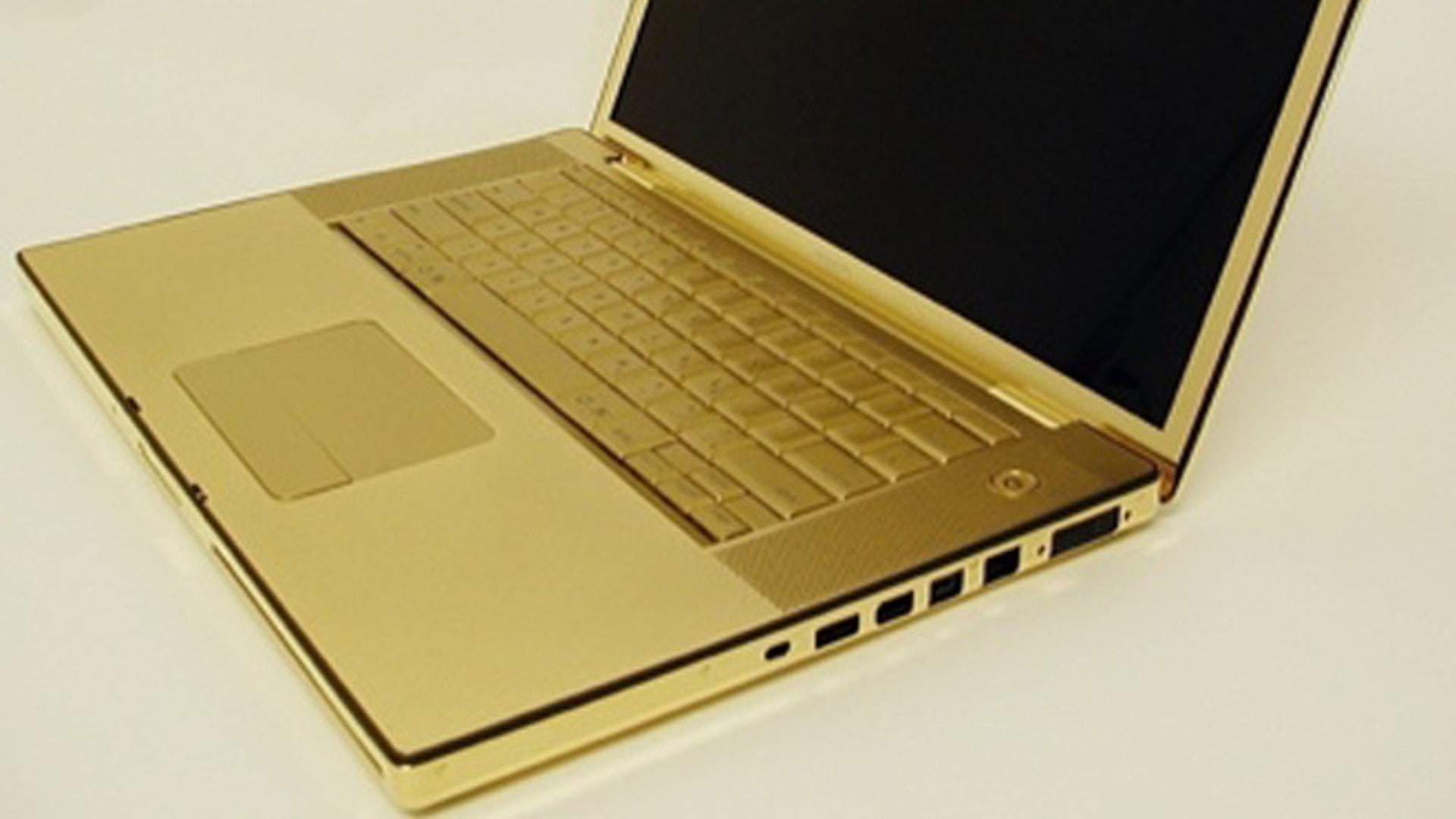 Компьютер gold. MACBOOK Pro 24 Karat Gold. Ноутбук асус черно золотой. Макбук АИР 2023 золотой. Luvaglio ноутбук.