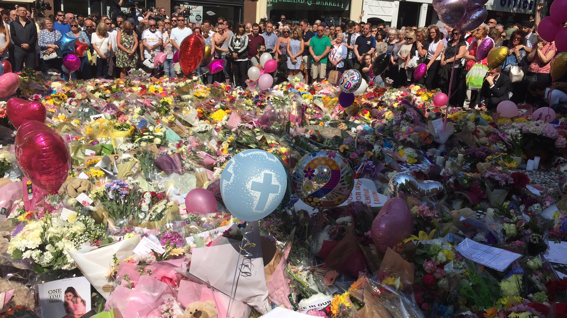 Passions were strong among residents who came to the center of the city to lay flowers 