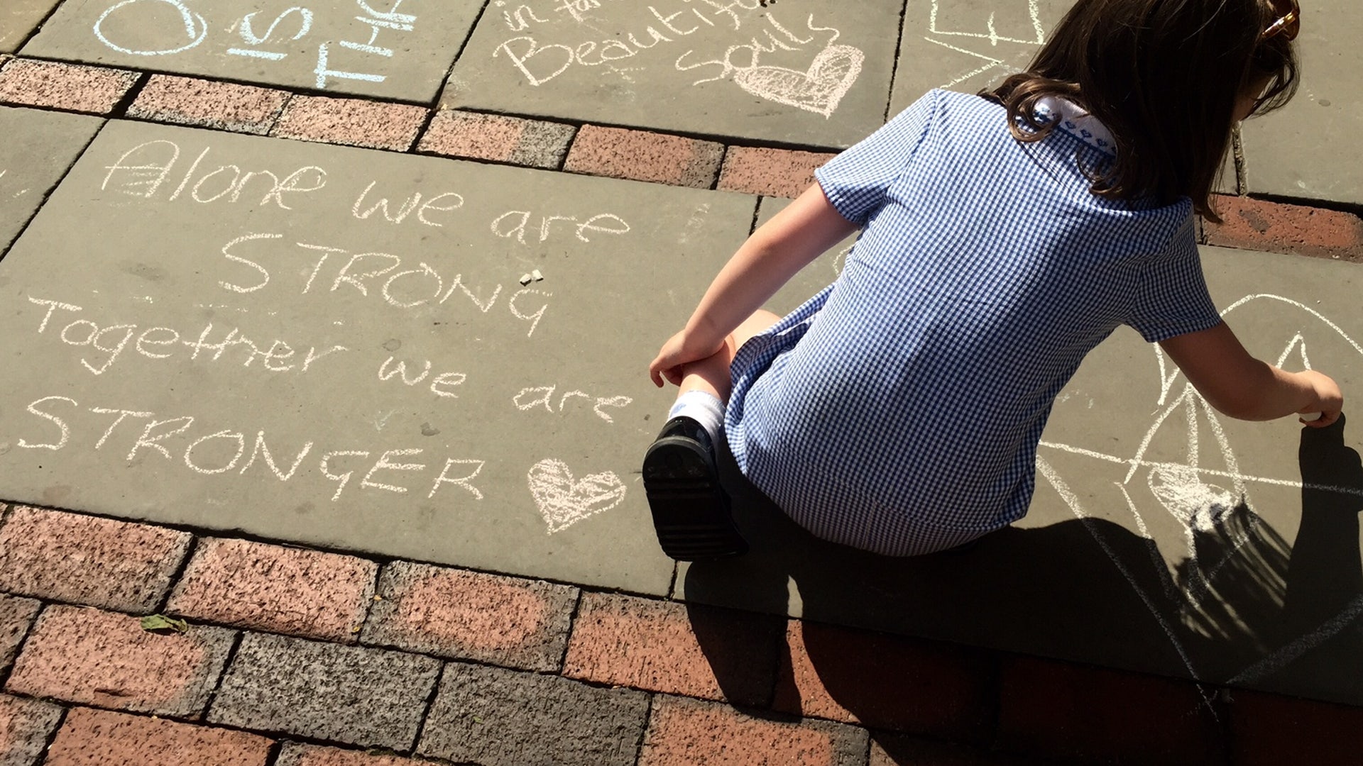 Along with the flowers, balloons and dolls, messages were left