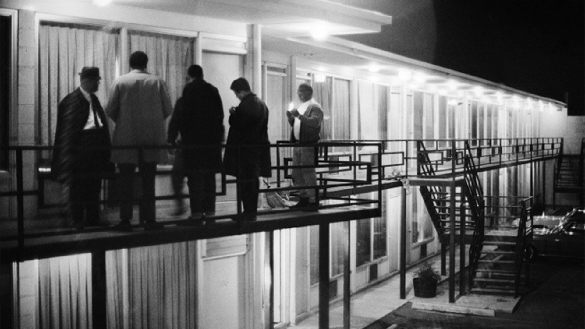 Colleagues of Rev. Martin Luther King Jr. stand outside the Lorraine Motel just a few feet from where the civil rights leader was killed, April 4, 1968.